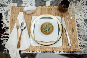 place setting with gold and natural tones