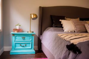 vintage turquoise night stand paired with new Pottery Barn bed