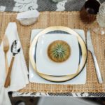 place setting with gold and natural tones