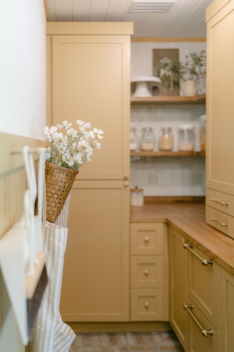 yellow farmhouse pantry cabinets